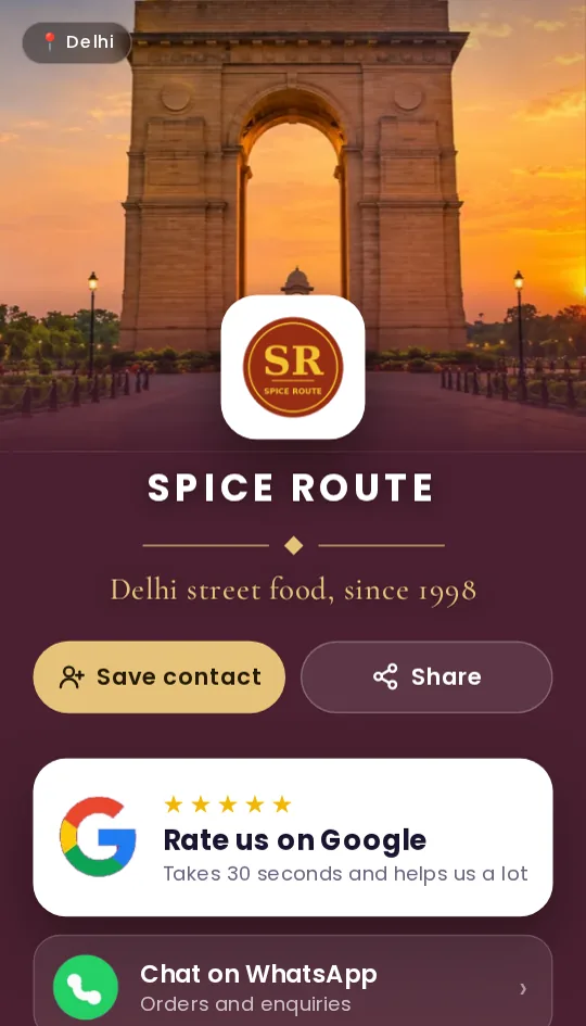 The page that opens when a customer taps a TapStar NFC business card: India Gate scenery across the top, the restaurant logo, Save contact, Share, Rate us on Google and Chat on WhatsApp