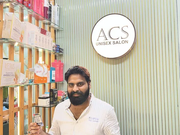 ACS Unisex Salon with their TapStar Google review card