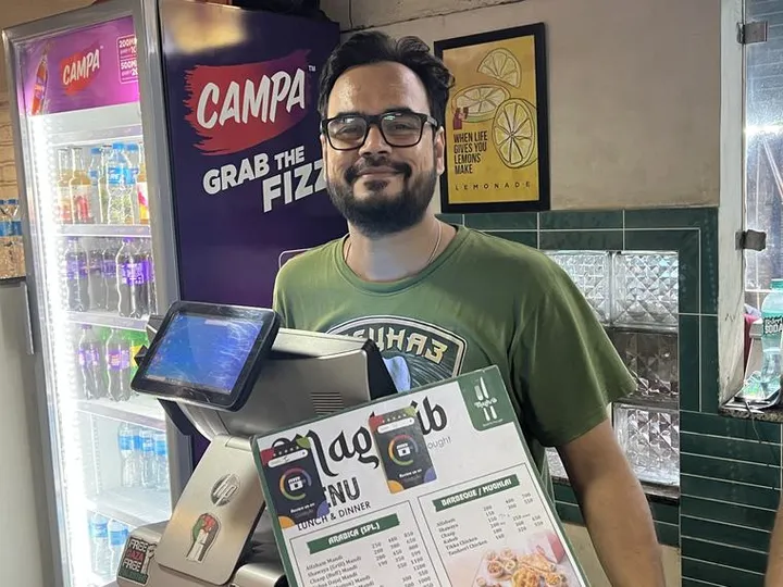 Maghrib Café & Restro with their TapStar Google review card