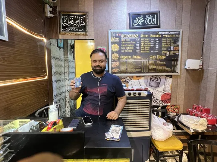 The Lazeezo Fried Chicken with their TapStar Google review card